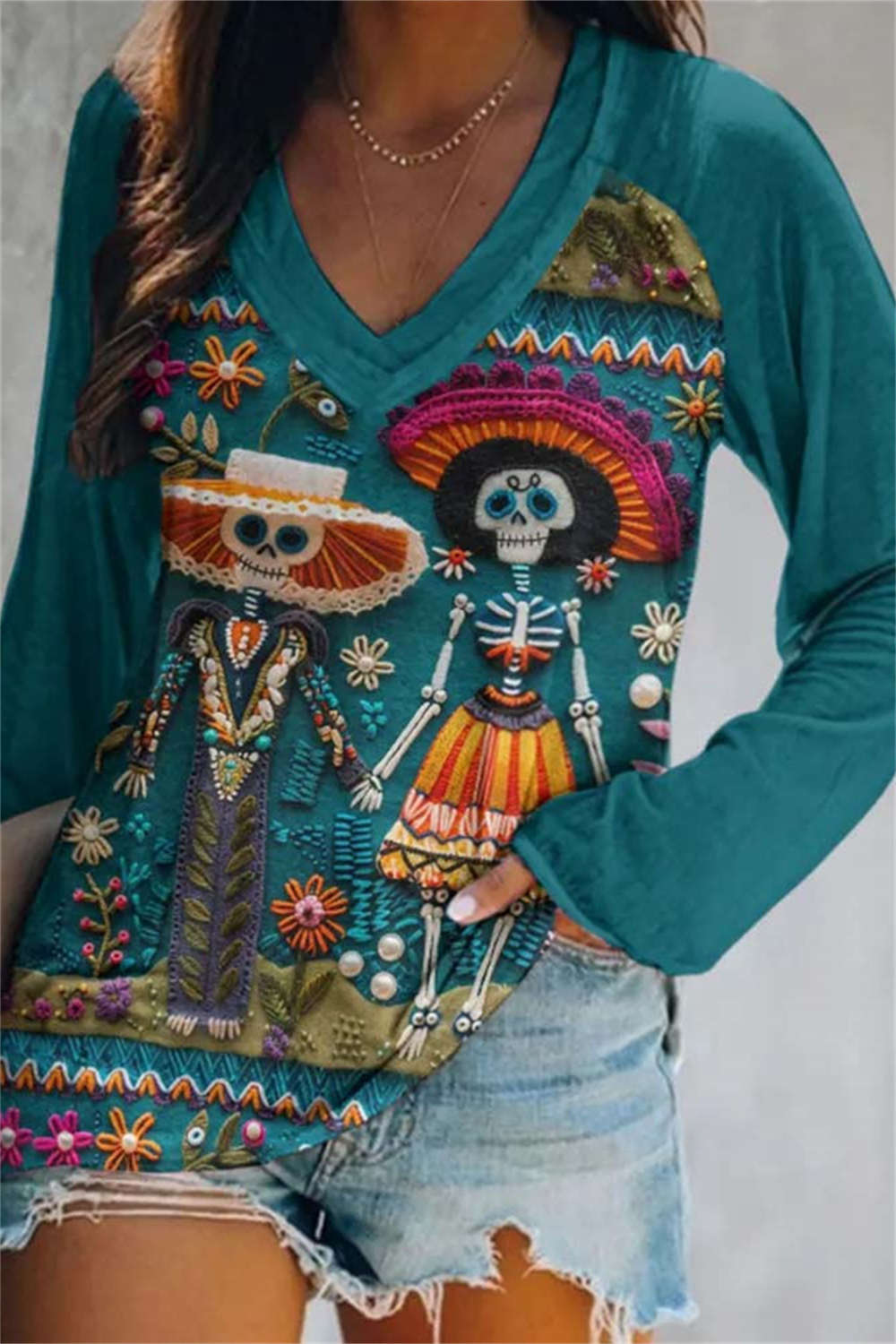 Andrea | Halloween-Inspired Teal Skeleton Print V Neck Long Sleeve Blouse