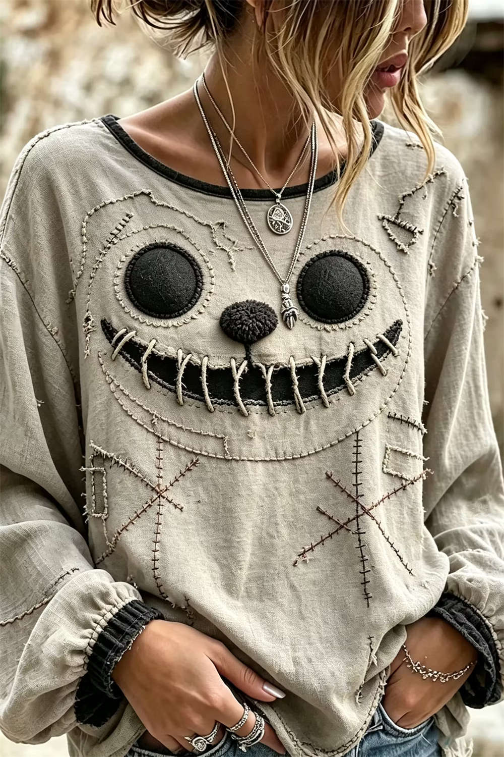 Noelle | Halloween-Inspired Beige Stitched Ghost Face Print Round Neck Long Sleeve Blouse