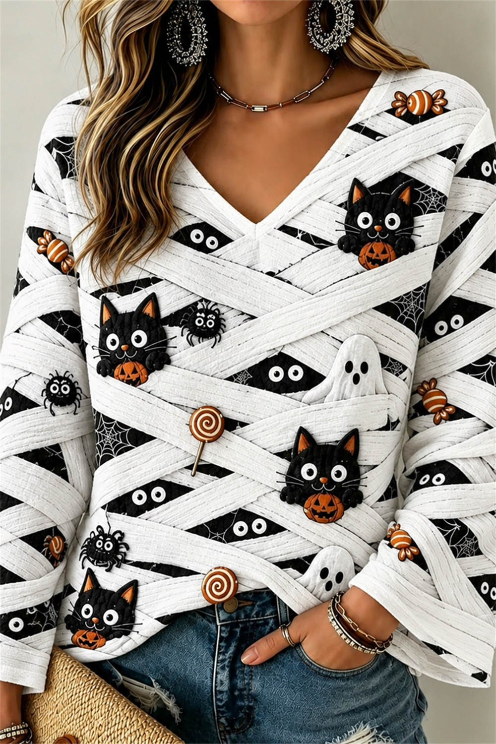 Francesca | Halloween-Inspired White Pumpkin Face Cat Print V Neck Long Sleeve Top